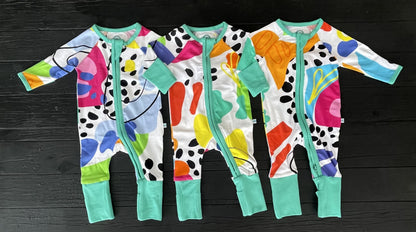3 x multi coloured long sleeve baby onesies with fold over hand and foot cuffs in unisex design